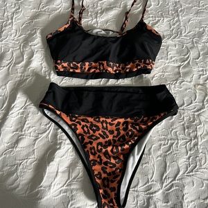 Never worn high waisted, two piece animal print